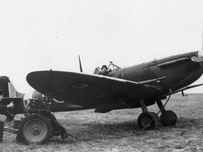 Ground personnel prepare to start a Spitfire Mk V