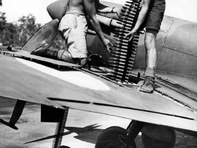 Loading ammunition into RAAF Spitfire