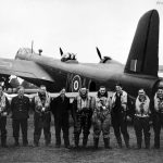 Aircrew stand in front of Stirling AA-M
