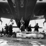 Stirling armourers loading bombs