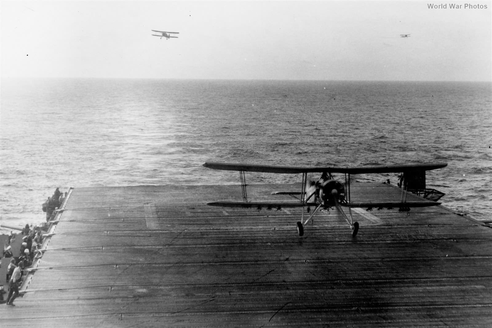Swordfish of No. 812 Squadron land on USS Wasp