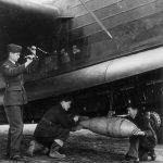 Armourers loading a 250lb bomb
