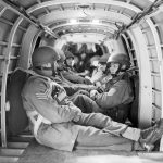 Paratroopers inside the fuselage of a Whitley