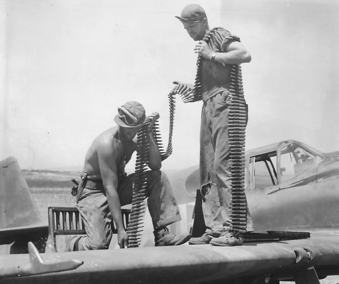 Crew Load Belts of Ammo on A-36 Apache in North Africa 1943