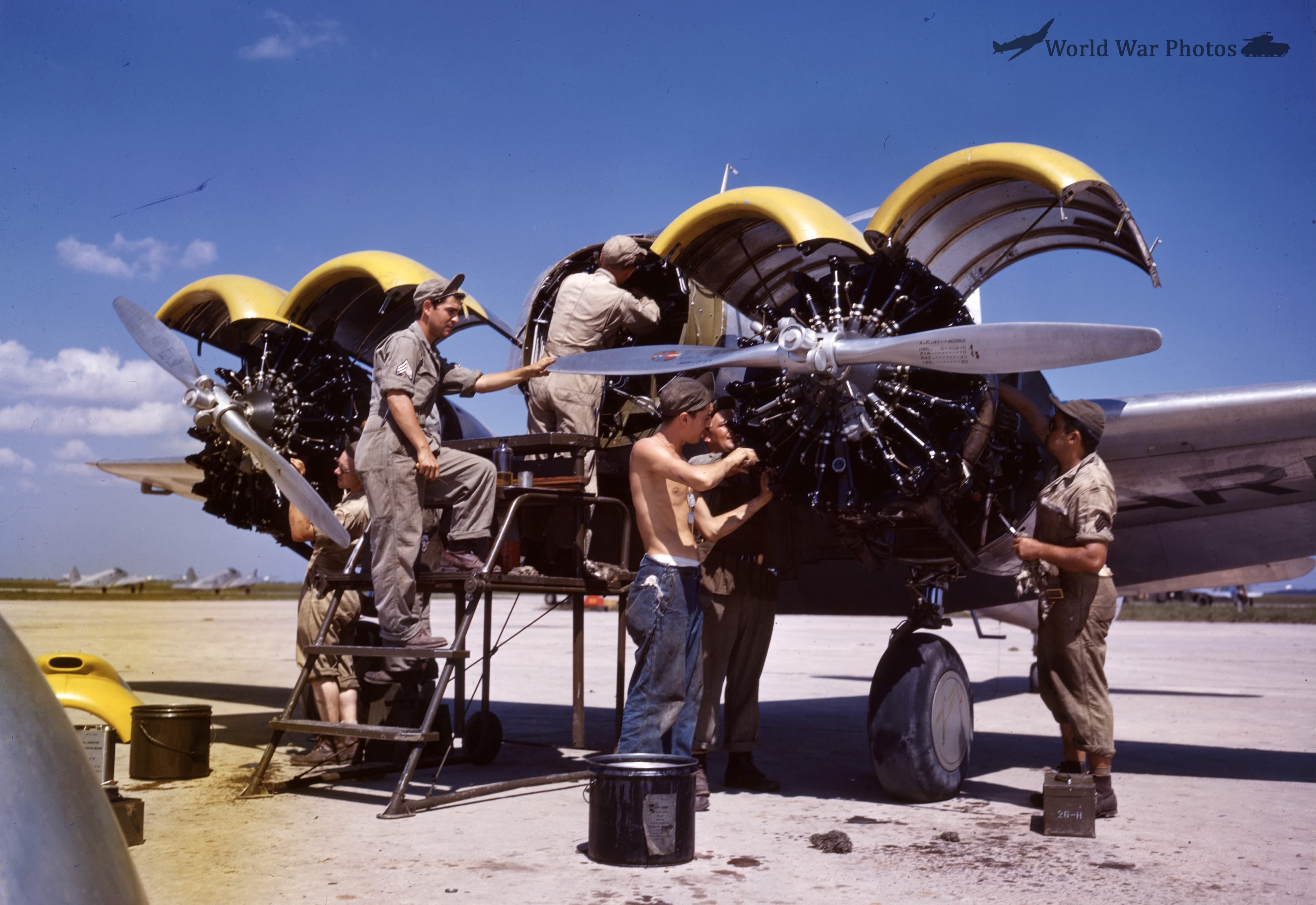 Mechanics Working on AT-9 engines