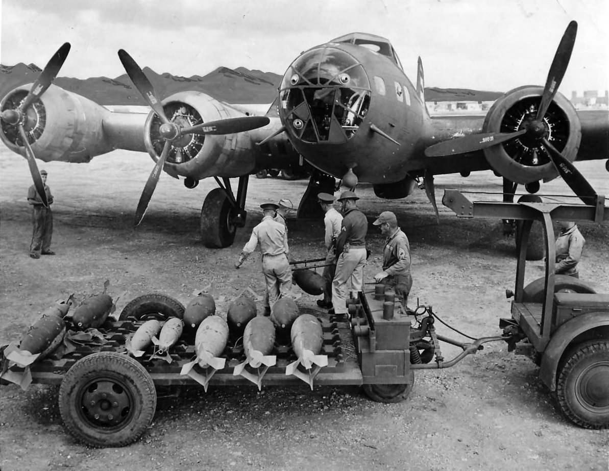 Boeing B-17D of the 19th Bomb Group being loaded with 100 and 500lb bombs. Pacific 1942