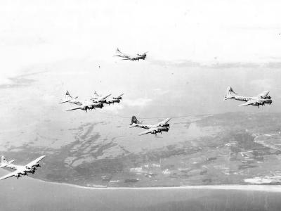 384th Bomb Group B-17G Bombers flying over coast