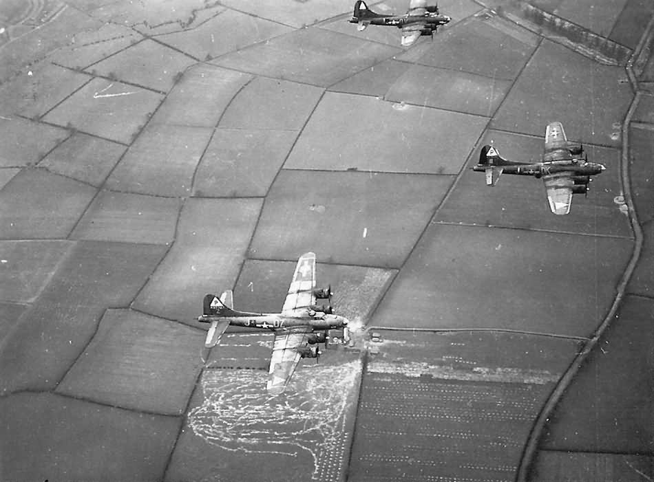 B-17 Flying Fortress formation over countryside 384th Bomb Group