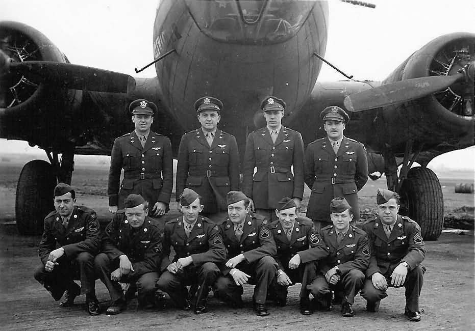 US aircrew posed in front of their B-17F bomber