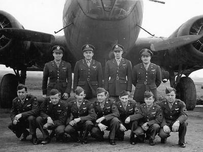 US aircrew posed in front of their B-17F bomber
