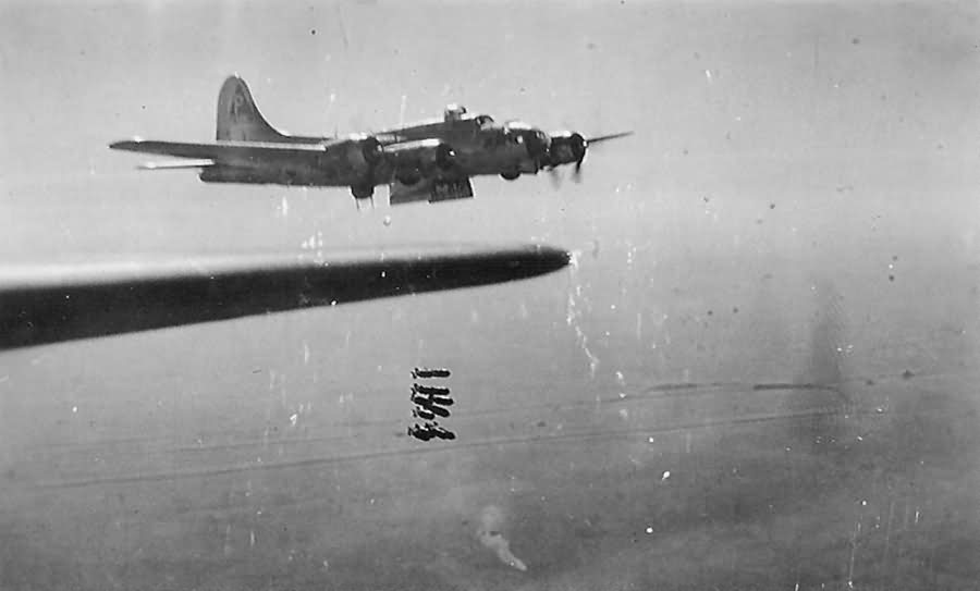 Aerial View of B-17 384th Bomb Group Bombers Dropping Bombs Over Target