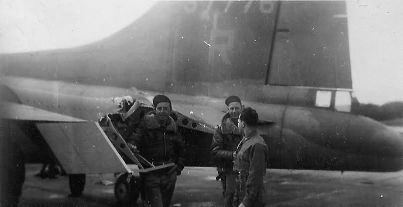 B-17 US Airmen by Flak Damaged Tails Section