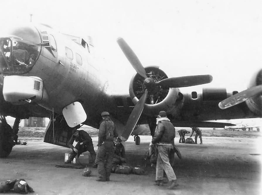 USAAF crew with their B-17 Flying Fortress Bomber on Airfield After a Mission