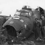 Luftwaffe officers are inspecting the wreck of B-17