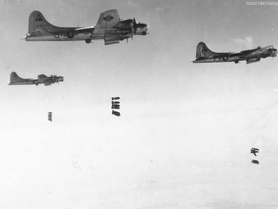384th BG B-17 bombers dropping bombs on target