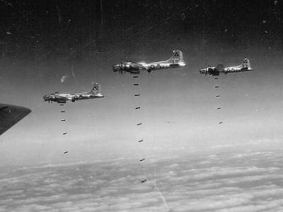 B-17s of the 398th BG dropping bombs on target