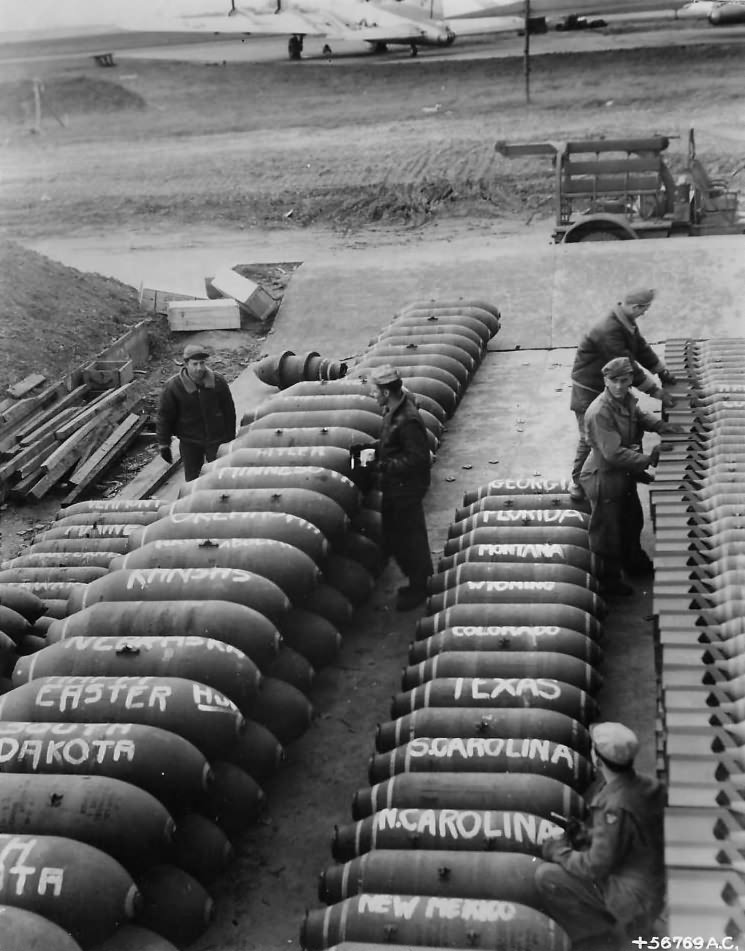 452nd Bomb Group’s ordnance crew prepare bombs for ’45