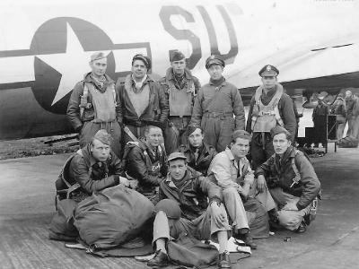 Aircrew of 384th BG, 544th BS in flight gear posed by their B-17