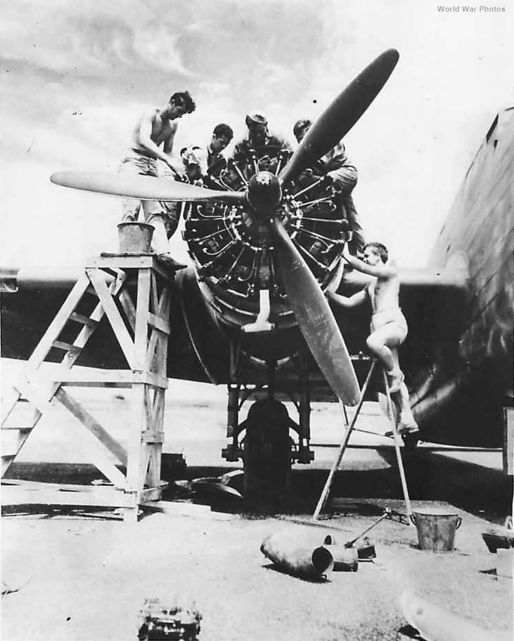 Mechanics checking the engine of a B-18 at a base in the Caribbean 1942