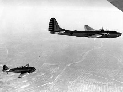Douglas XB-19 and AT-6 in flight
