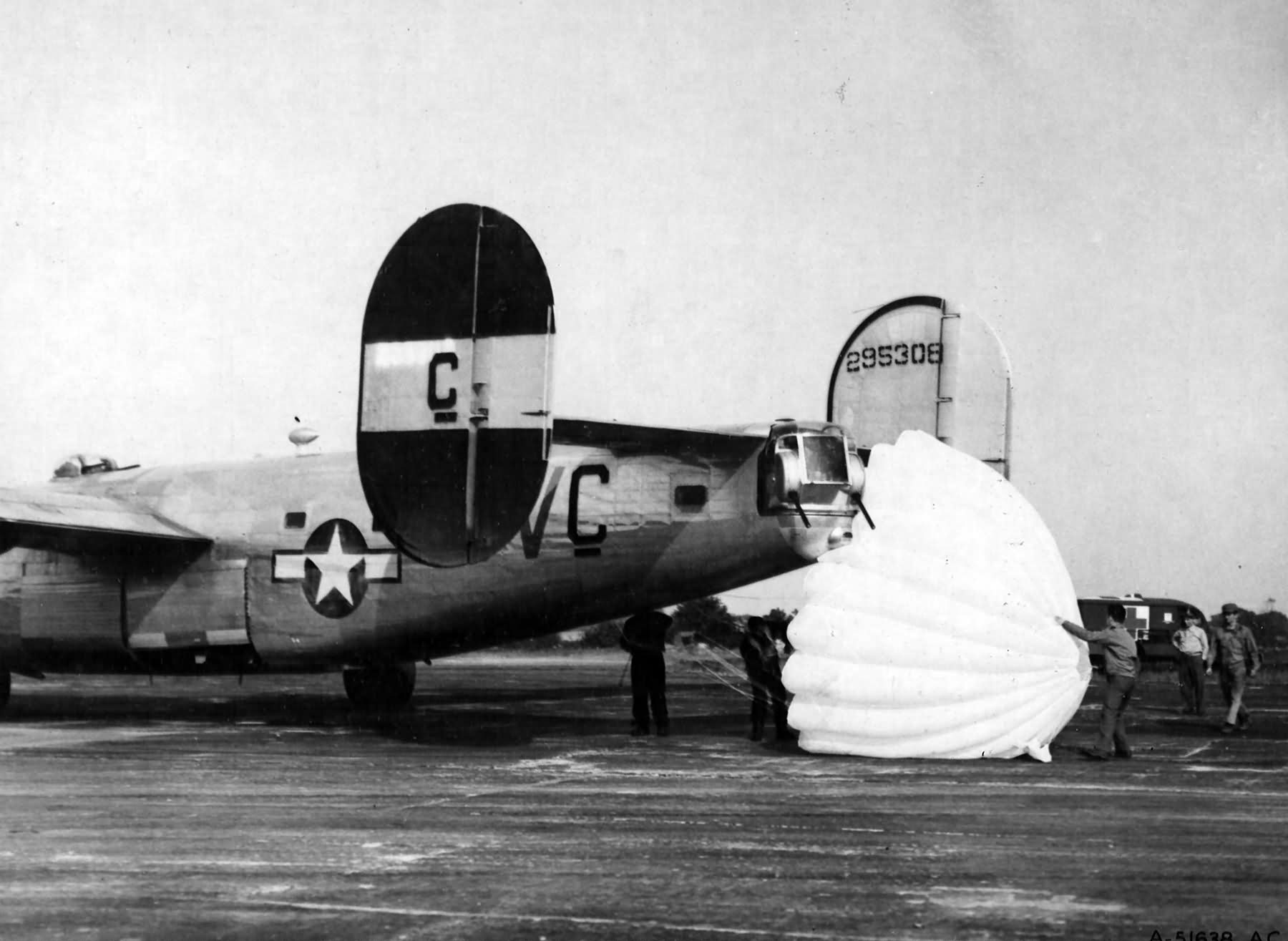 B-24 had to use parachutes for brakes to land at its base in England of the 445th BG 702nd BS