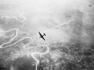 Shot Down B-24 Liberator Going Down with Smoke Pouring From Port Engine