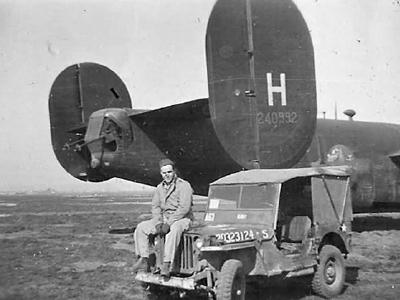 Willys Jeep by Parked B-24D Bomber 42-40992 on Airfield