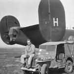 Willys Jeep by Parked B-24D Bomber 42-40992 on Airfield