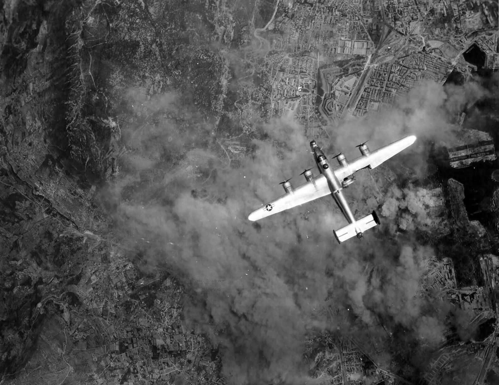 limping B 24 Liberator of the 376th Bomb Group over Toulon France 8 June 1944