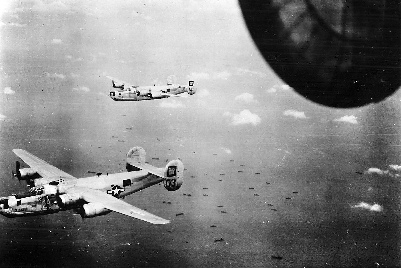13th Air Force 5th Bomb Group 23rd BS B-24M Liberators #03 and #14 over Balikpapan October 1944