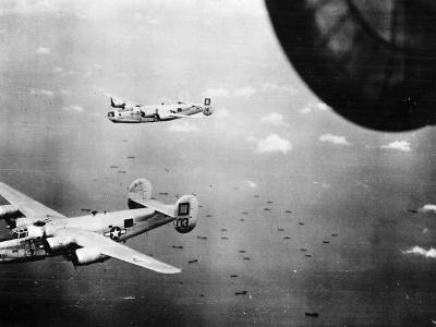 13th Air Force 5th Bomb Group 23rd BS B-24M Liberators #03 and #14 over Balikpapan October 1944