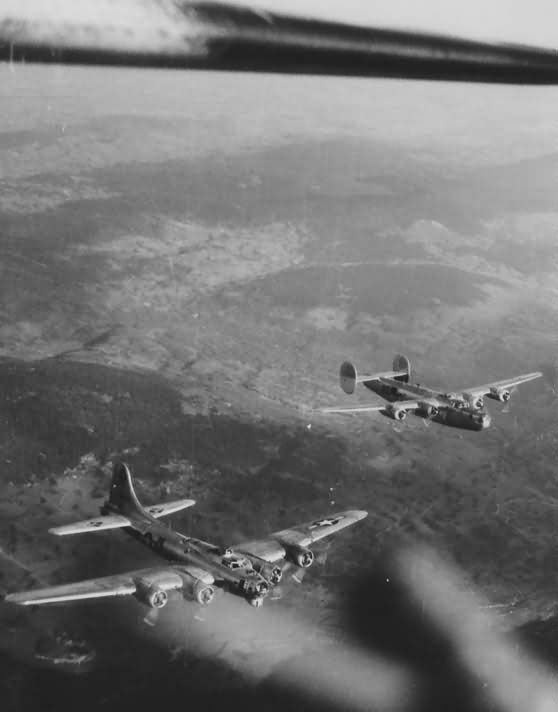 B-17 and B-24 limp home together following the October 7 1944 strike on Vienna