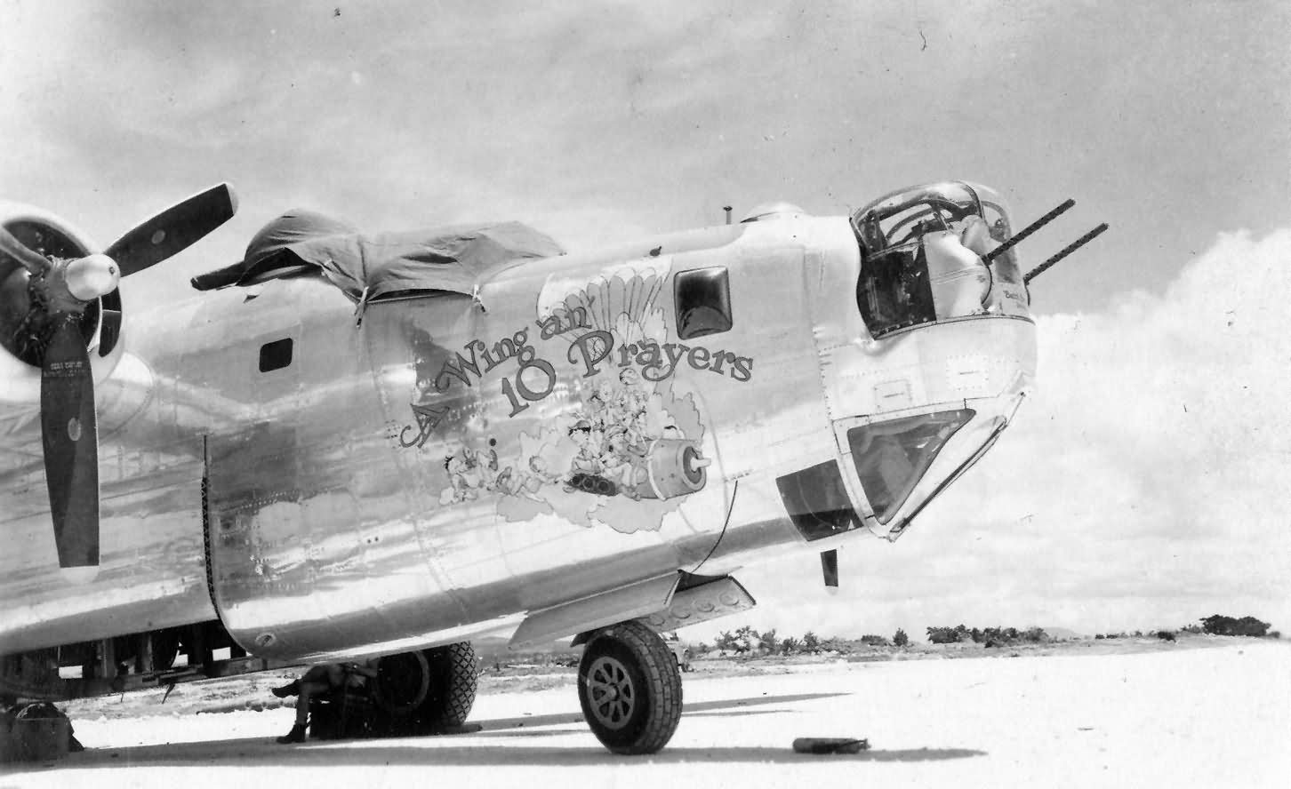 B-24M Liberator 44-42378 of the 380th Bomb Group - Nose art A "Wing an...