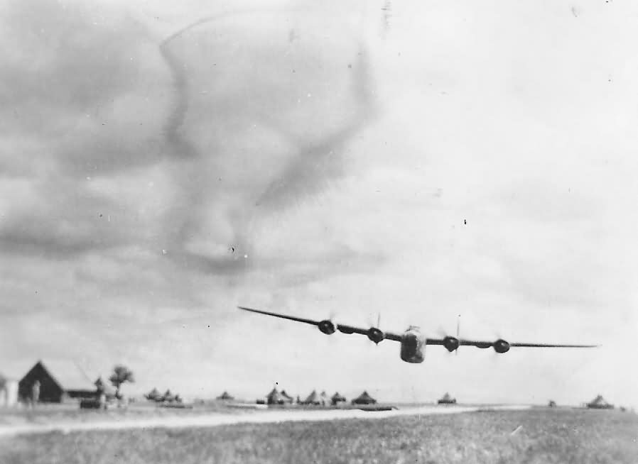 B-24 Liberator flight cross the airfield at very low level