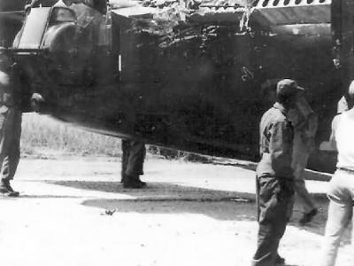 B-24 Liberator with Heavy Battle Damage to Tail Section
