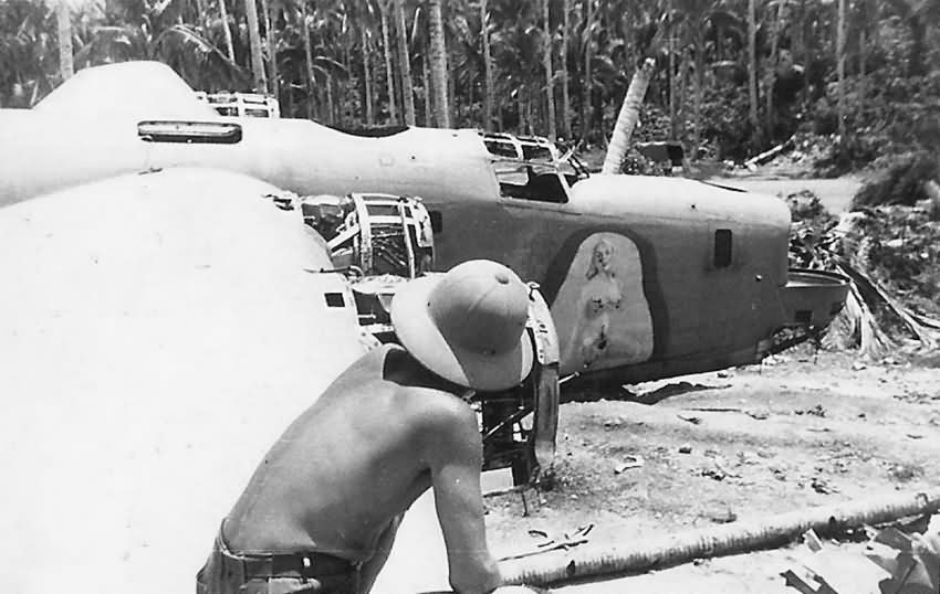 US Soldier with Crashed B-24 Bomber by Jungle Pacific