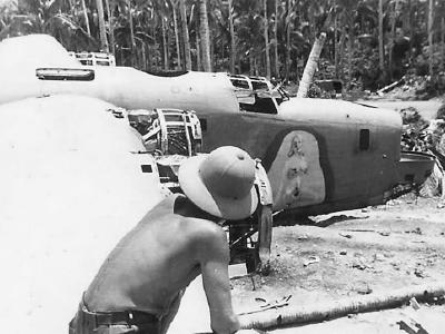 US Soldier with Crashed B-24 Bomber by Jungle Pacific