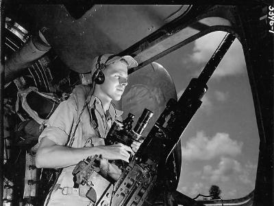 Waist Gunner in Position on B-24 Liberator During Mission