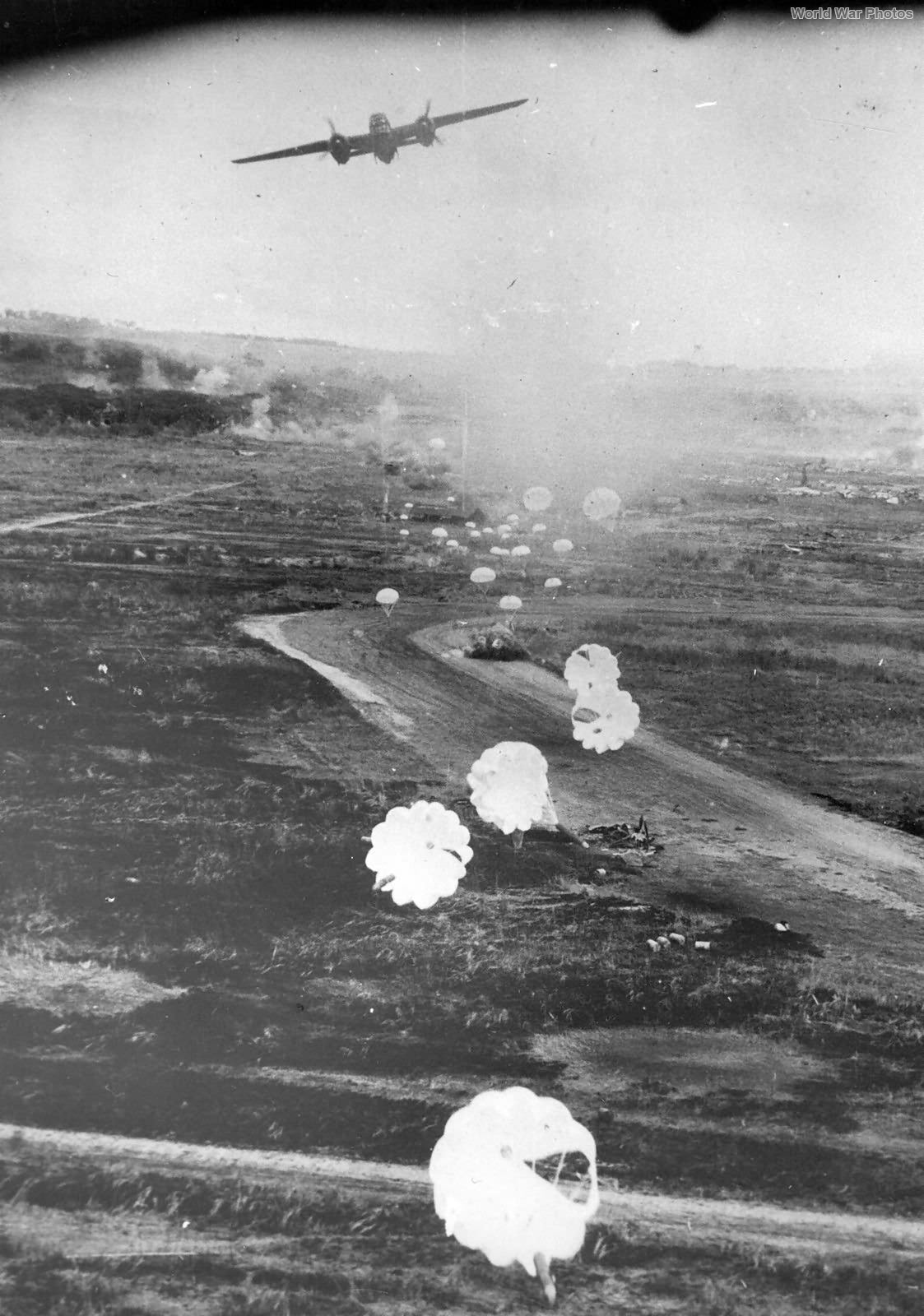 B-25 of the 499th BS „Bats Outa Hel”dropping parafrag bombs