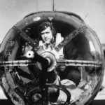 1st Lt Ralph G McConnell occupying his position in the nose of his B-26 1944
