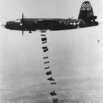 Bombs fall from B-26 42-95857 of 556th BS, 387th Bomb Group