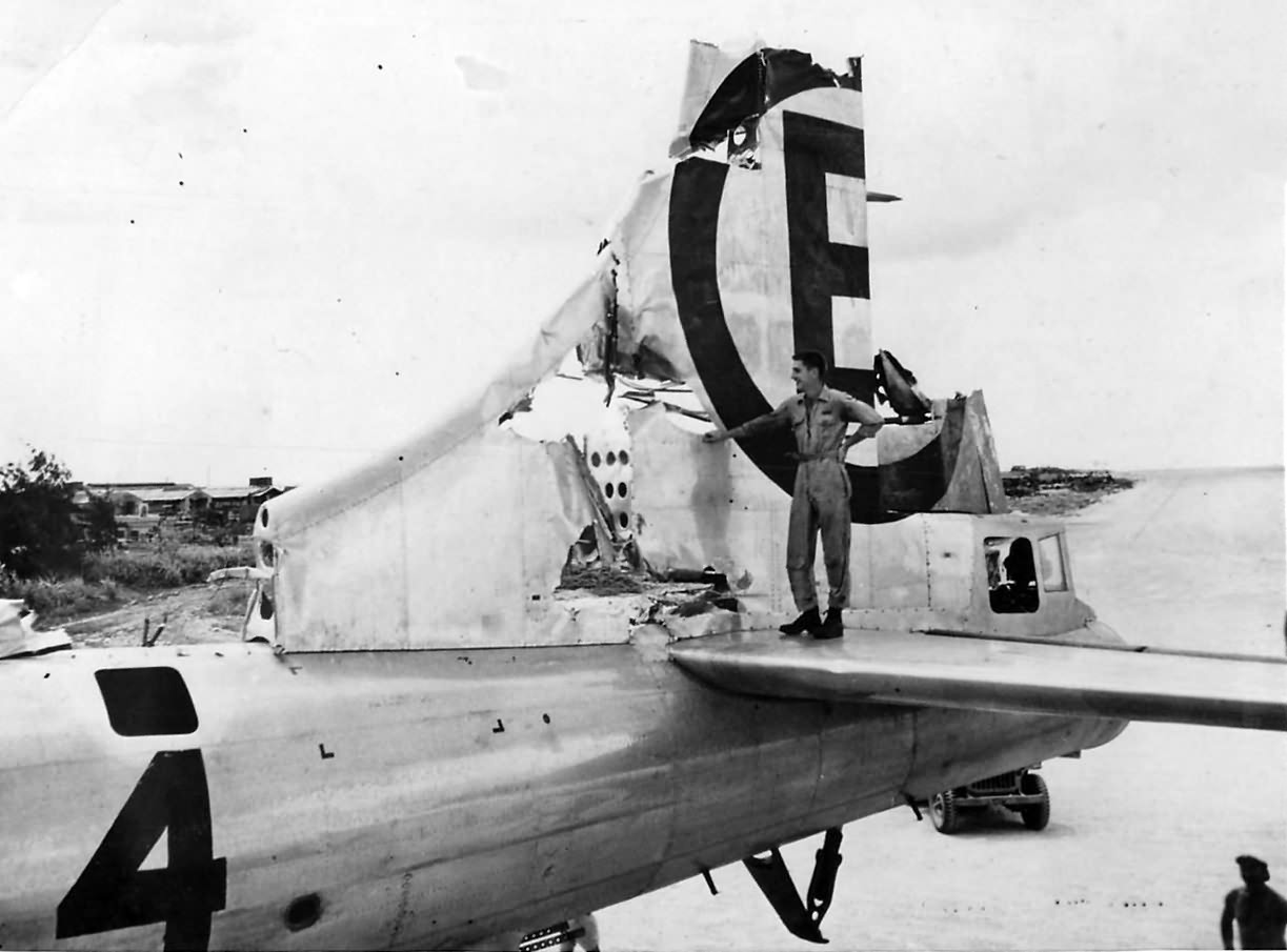 Damaged tail of 504th BG, 24th BS B-29 #4 on Tinian, 1945