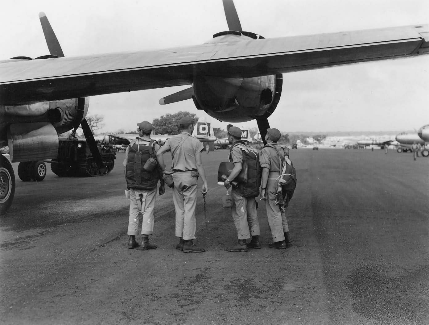 USAAF Crew Look at 29th bomb group Boeing B-29 Superfortress bombers GUAM