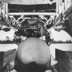 Loading 5400 kg (12,000 lb) US Tallboy bomb on B-29 Marianas