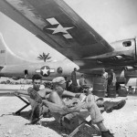 soldiers Rest Under Wing of Boeing B-29 at Marianas Base