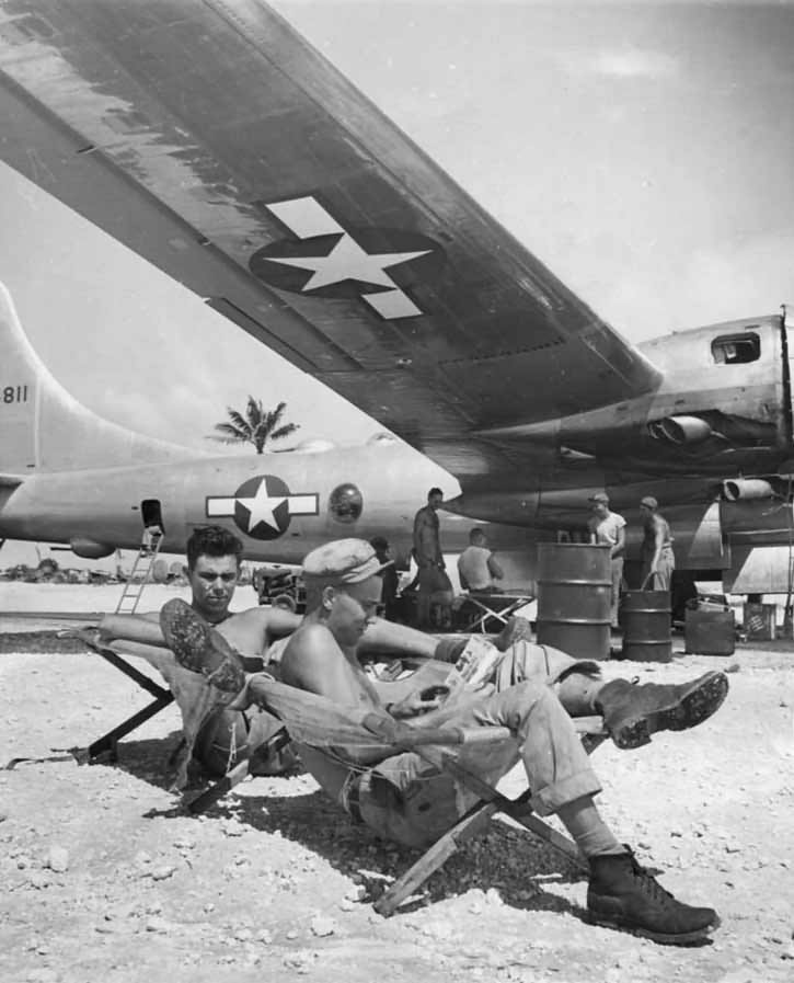 soldiers Rest Under Wing of Boeing B-29 at Marianas Base