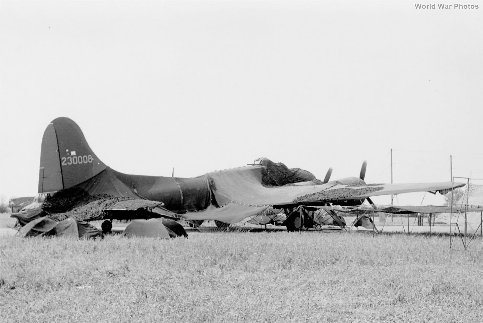 B-17F 42-30008 of 92nd BG under camo netting