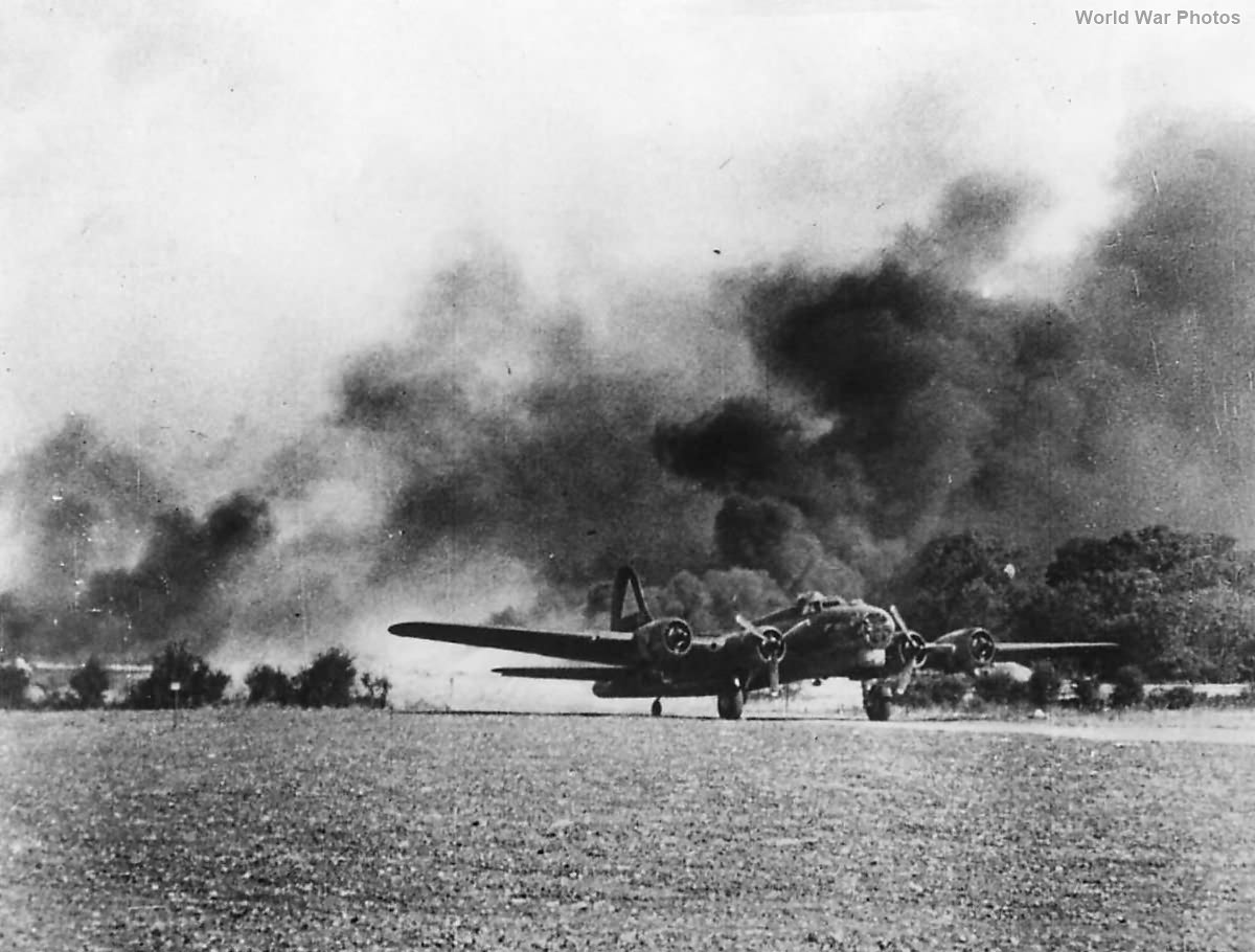 B-17 lands safely as another burns upon return from Schweinfurt 1943
