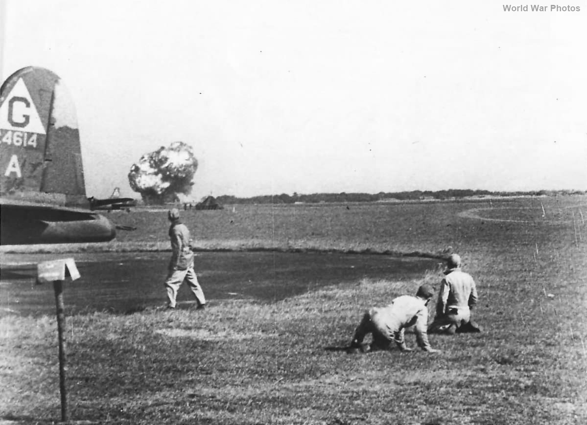 Ground crew watches returning B-17 explode after Schweinfurt 1943