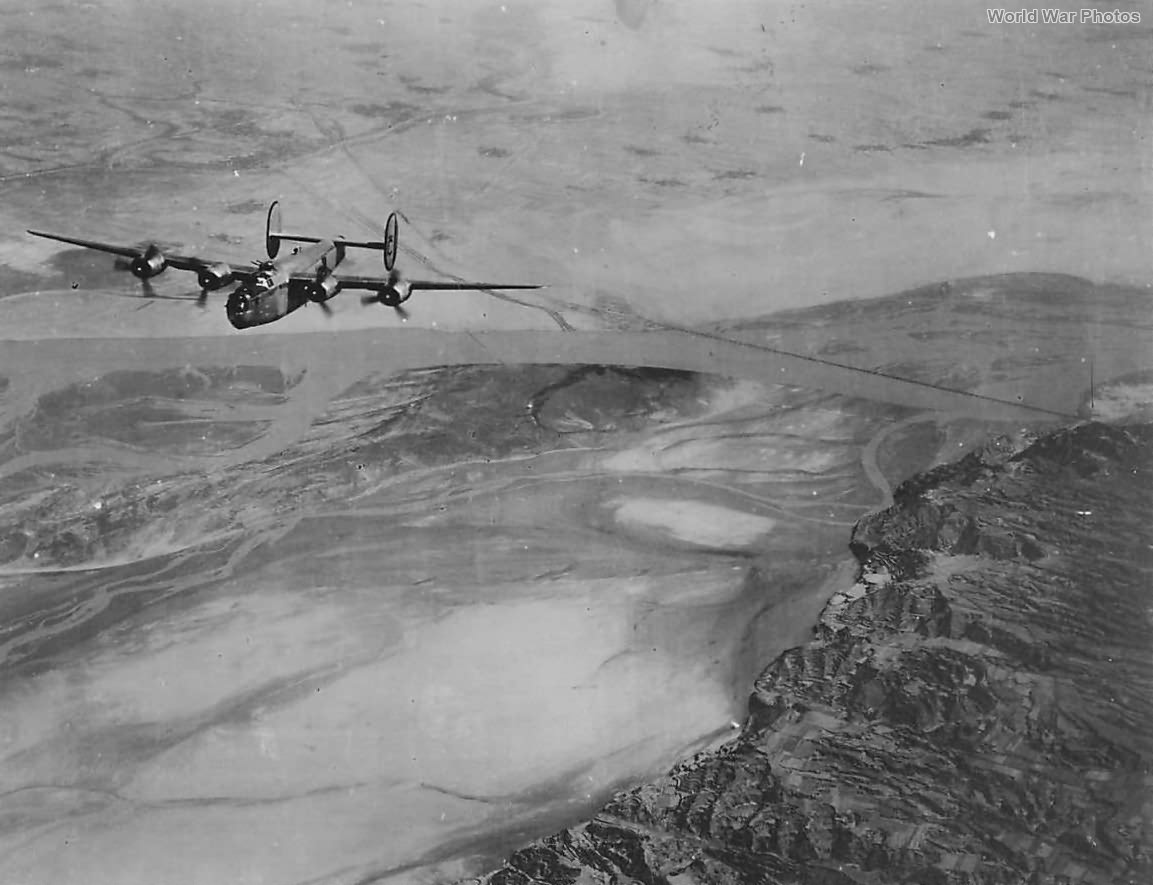 14th AF B-24 over China’s Old Yellow River Bridge 1945